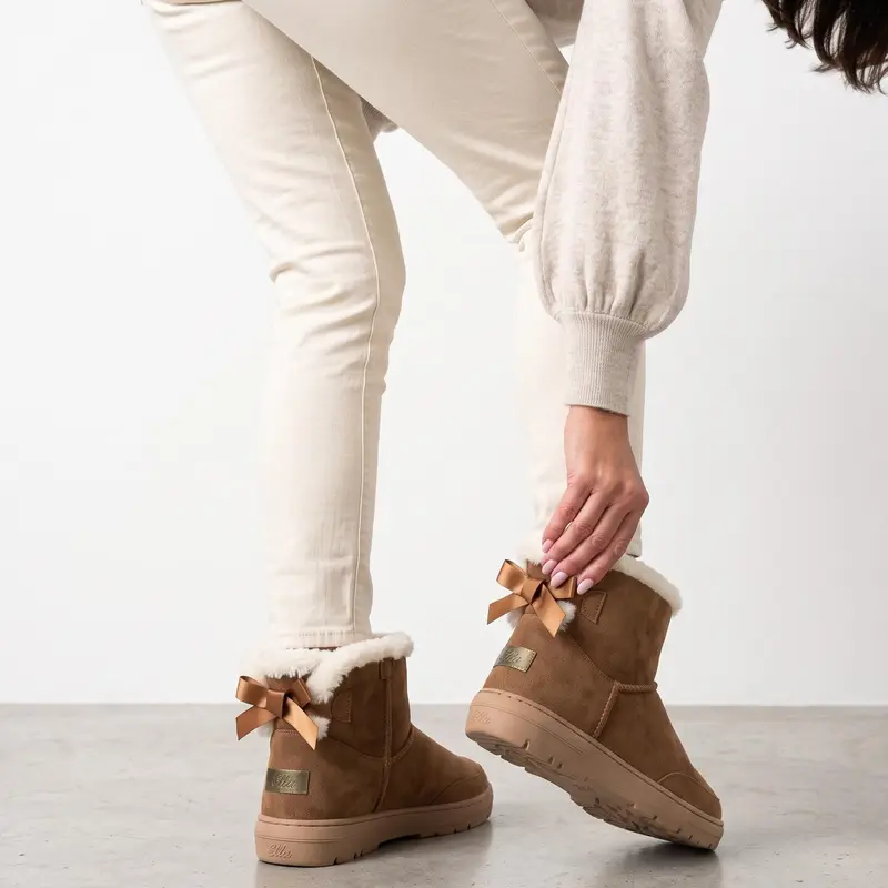 Mocca plush-lined ankle boots with a satin bow